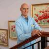 Gynecologist and IVF specialist Andrei Sõritsa standing on stairs, looking into camera.
